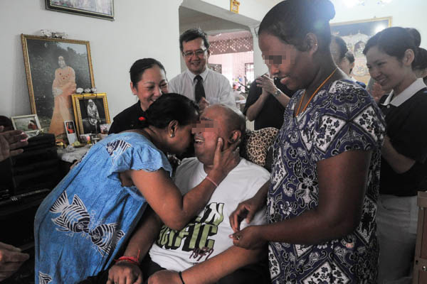 Receiving Blessings from Buddha at Home