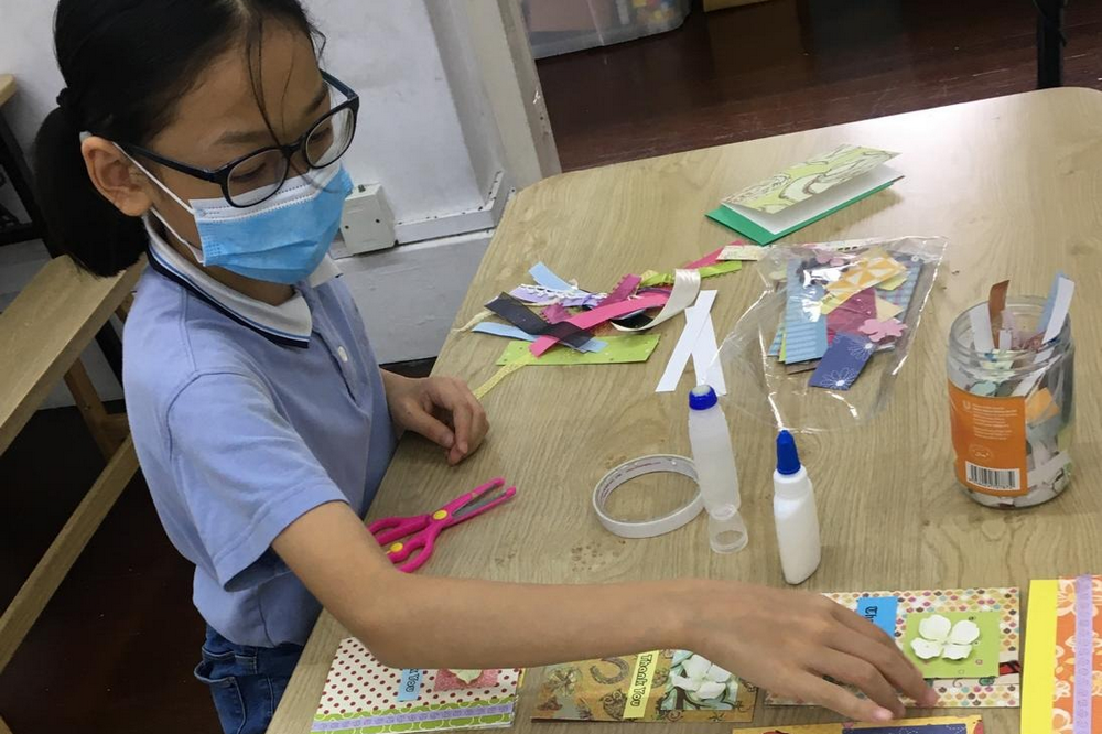 A total of 25 students from the Centre are also involved in making 400 thanksgiving cards meant for healthcare workers under an initiative by Project Wellness. (Photo by Lim Siew Lee)